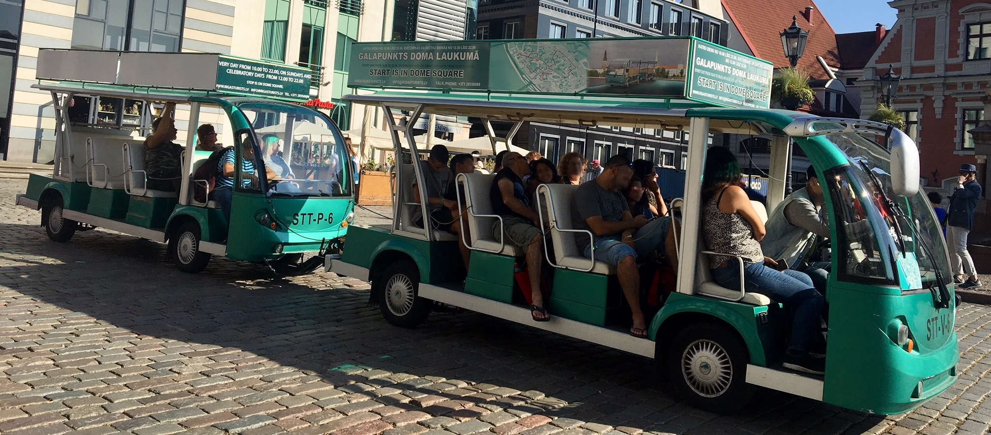 Our green bus in the middle of the Town Hall Square